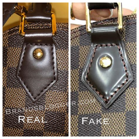 louis vuitton alma real vs fake|real louis vuitton.